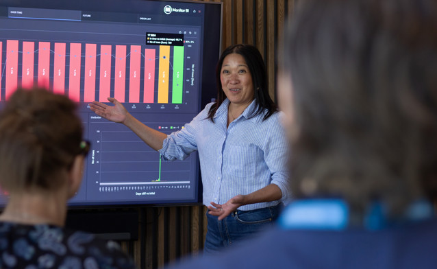 Woman presenting figures